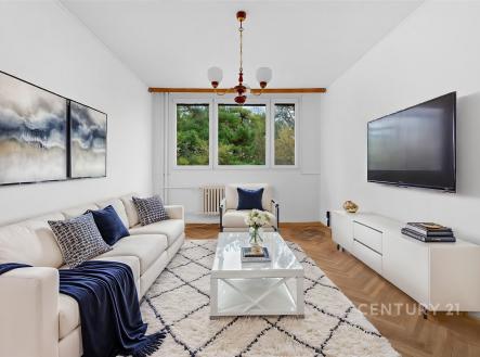 Světlý obývací pokoj s parketovou podlahou, velkými okny a moderním zařízením, nabízí útulný a elegantní prostor pro relaxaci. | Prodej bytu, 3+1, 66 m²