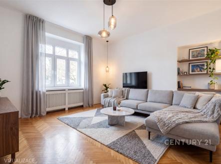 Světlý obývací pokoj s parketovou podlahou, velká okna, moderní nábytek a minimalistický dekor, ideální pro komfortní bydlení. | Prodej bytu, 3+1, 64 m²