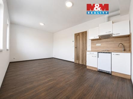 wide_angle_interior_photo_of_a_small_modern_empty.jpg | Pronájem bytu, 1+kk, 27 m²