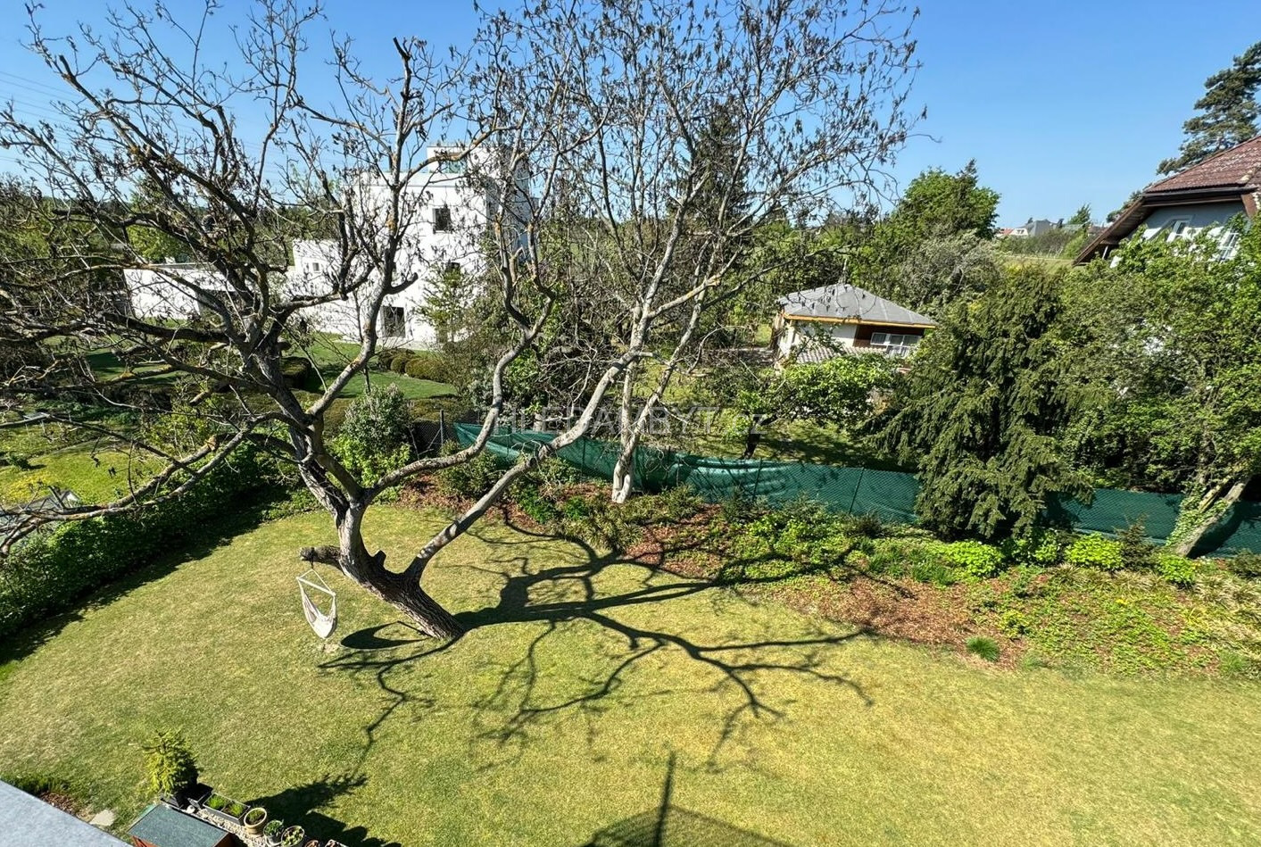 Pronájem novostavby Praha 6 Suchdol 4+kk s terasou a garážovým stáním Nad Mohylou