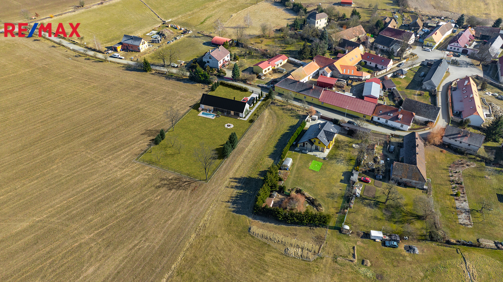 Pozemek s domem