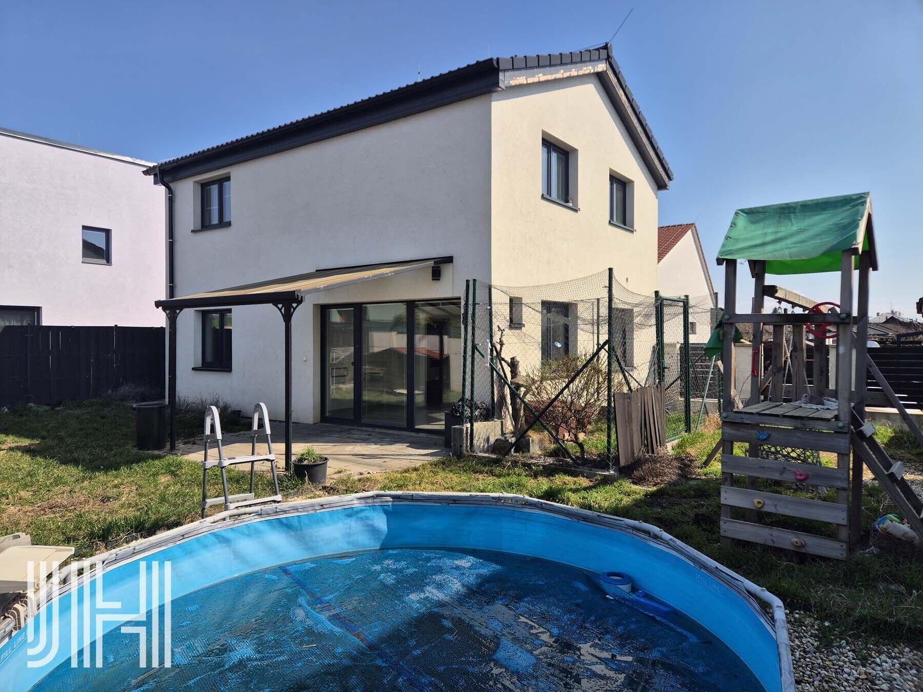 Prodej novostavby domu 5+kk se zahradou s výhledem na město