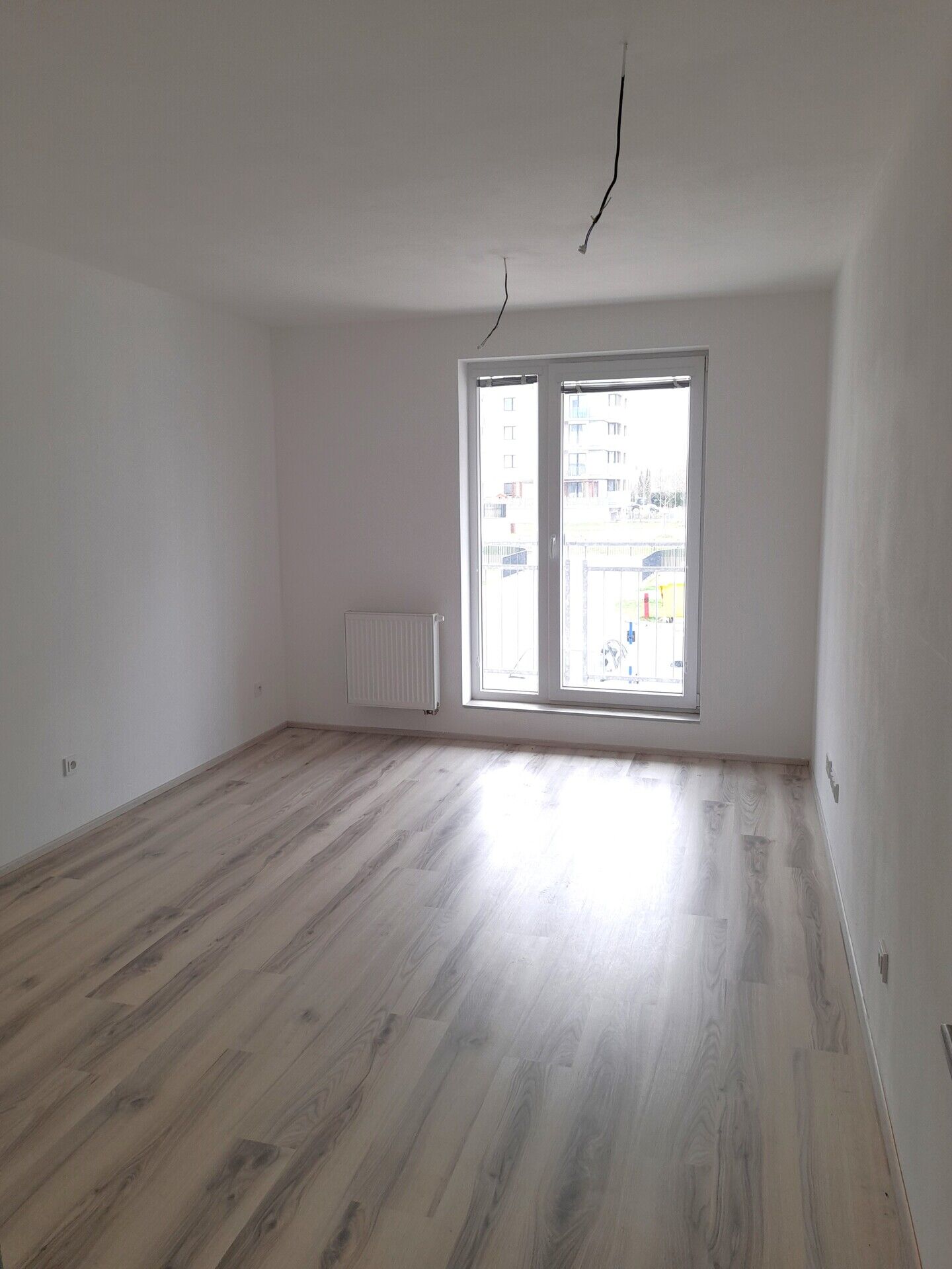 Prodej hezkého nového bytu 2+kk, 50 m2, s terasou 8 m2 v širším centru Poděbrad, okr. Nymburk