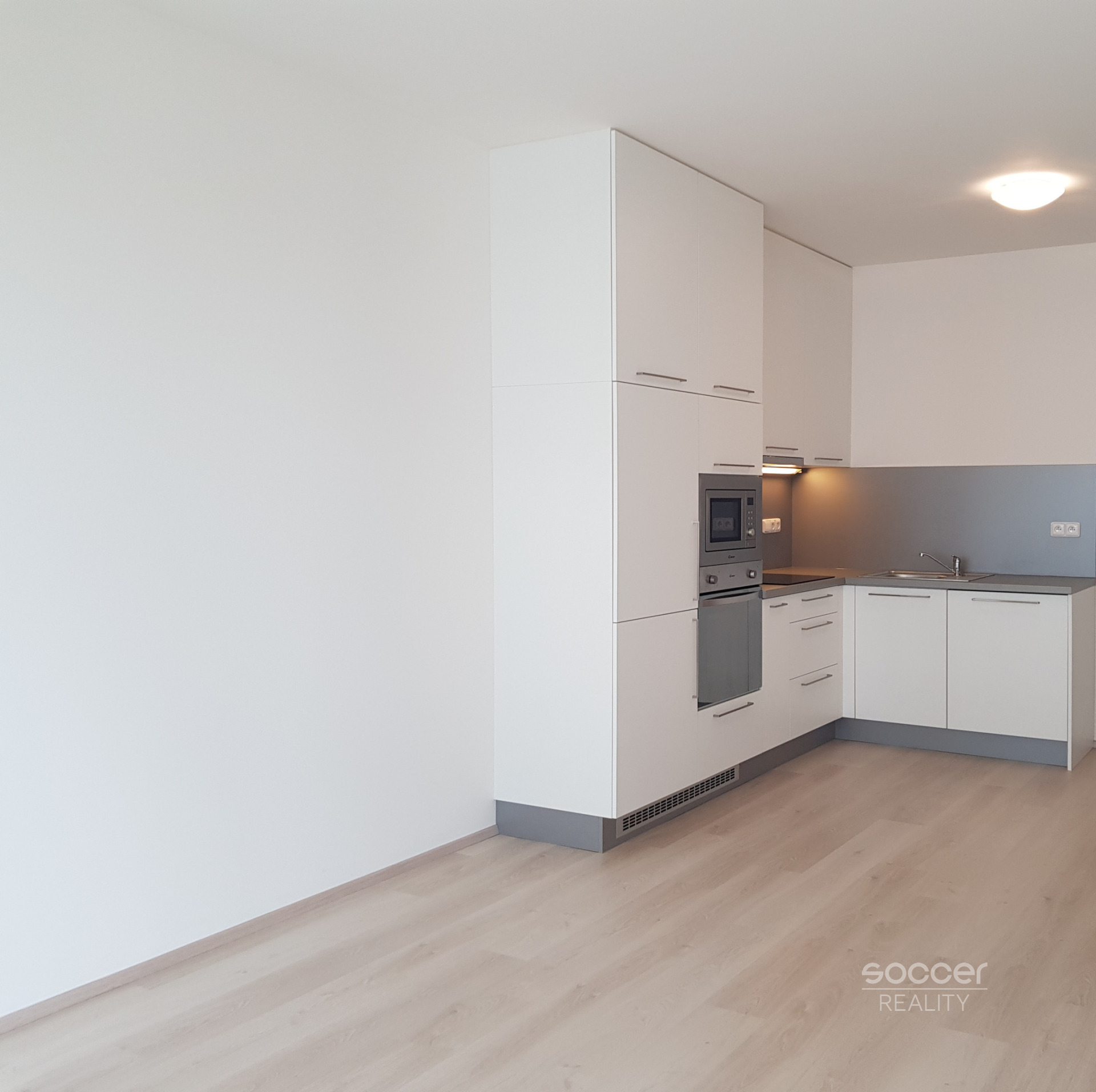 Pronájem nového bytu 1+kk, 31 m2, v Praze 15 - Dolní Měcholupy, ul. Františka Jansy.
