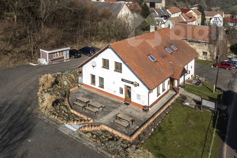 Výjimečný dům 5+kk s potenciálem 3 bytových jednotek v srdci Českého středohoří