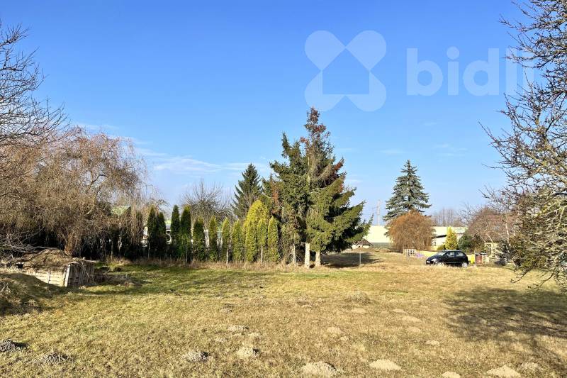 Prodej stavebního pozemku v Holkově