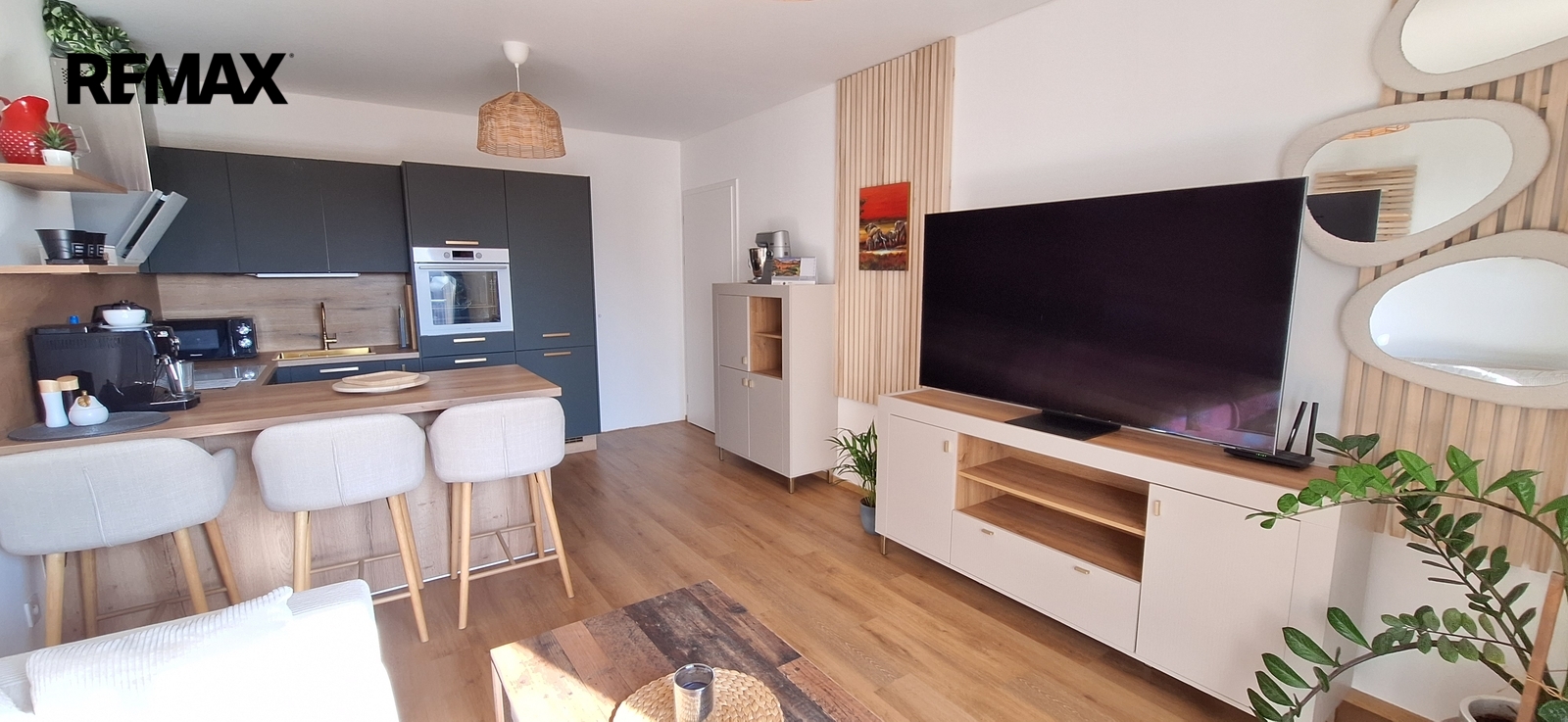 Obývací pokoj s kuchyňským koutem