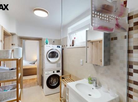 byt-31-praha-6-suchdol-olsova-5585-s-terasou-zahradou-a-sklepem-10302025-100524.jpg | Prodej bytu, 3+1, 150 m²