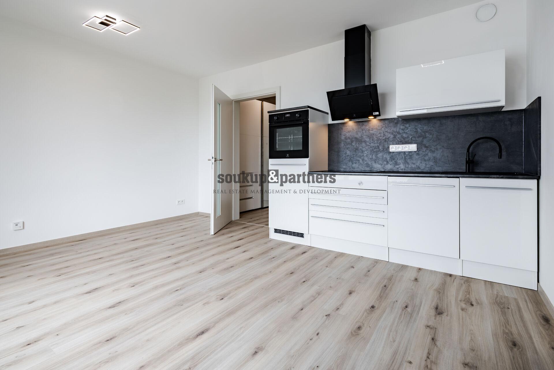 Pronájem nového bytu 1+kk, 28 m², garážové stání a sklep v ceně – Praha 9, Letňany