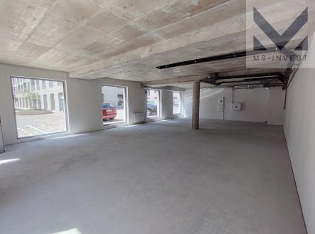 Interiér jednotky E 103 | Prodej - obchodní prostor, 119 m²