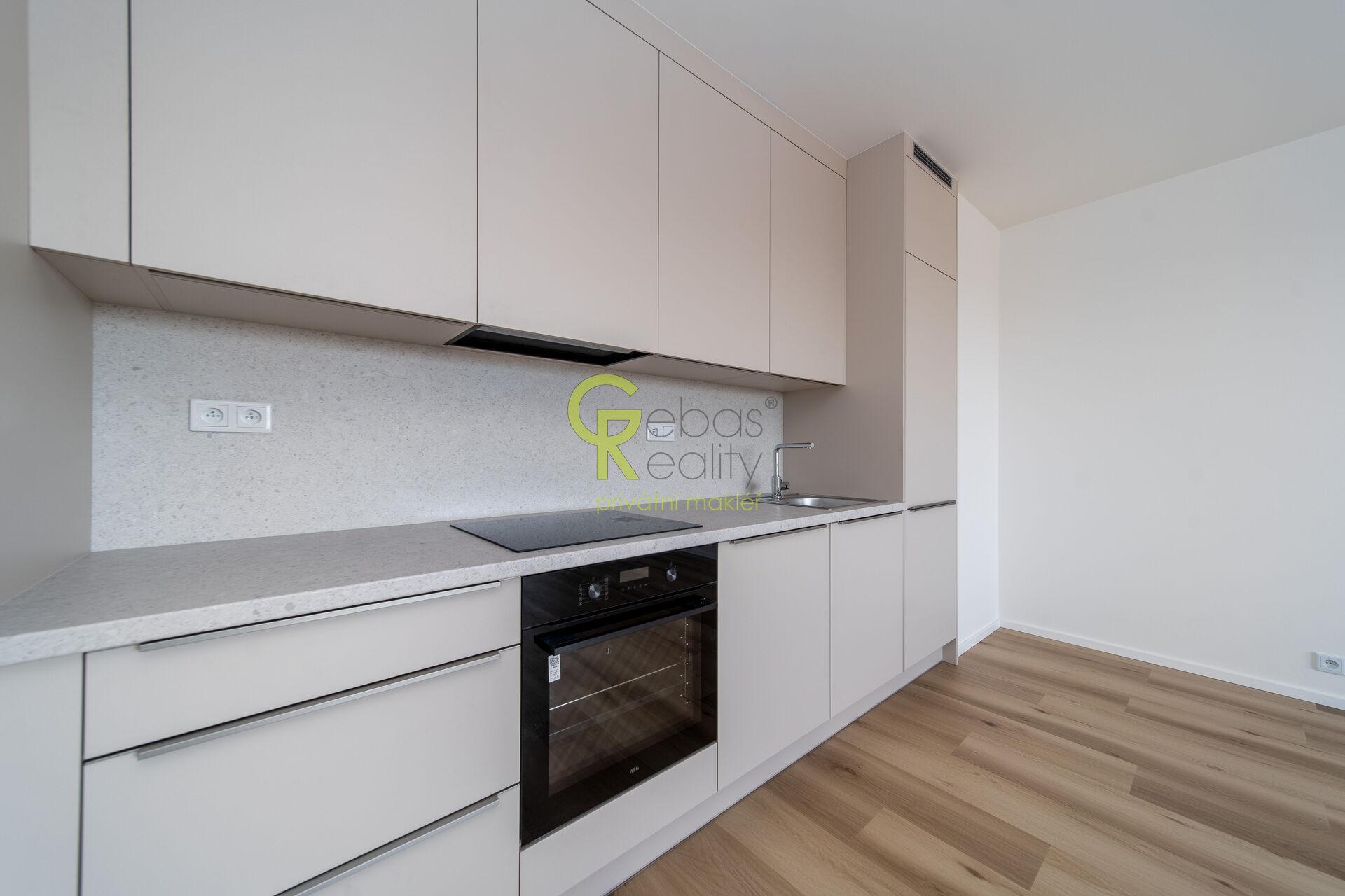 Pronájem bytu 2+kk s balkonem, garážovým stáním a sklepem – novostavba Sija Kamýk, Praha 12
