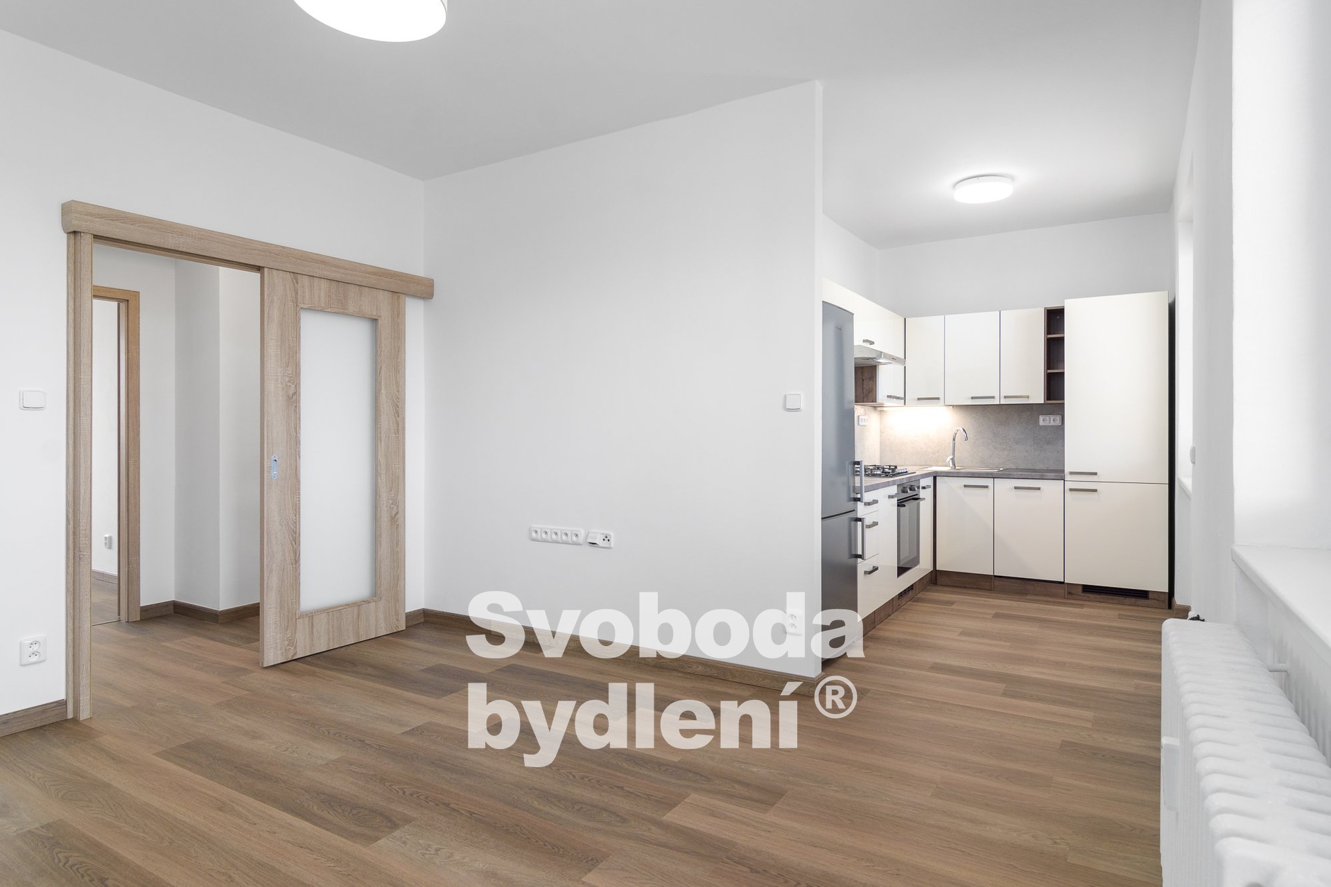 Obývací pokoj s kuchyňským koutem