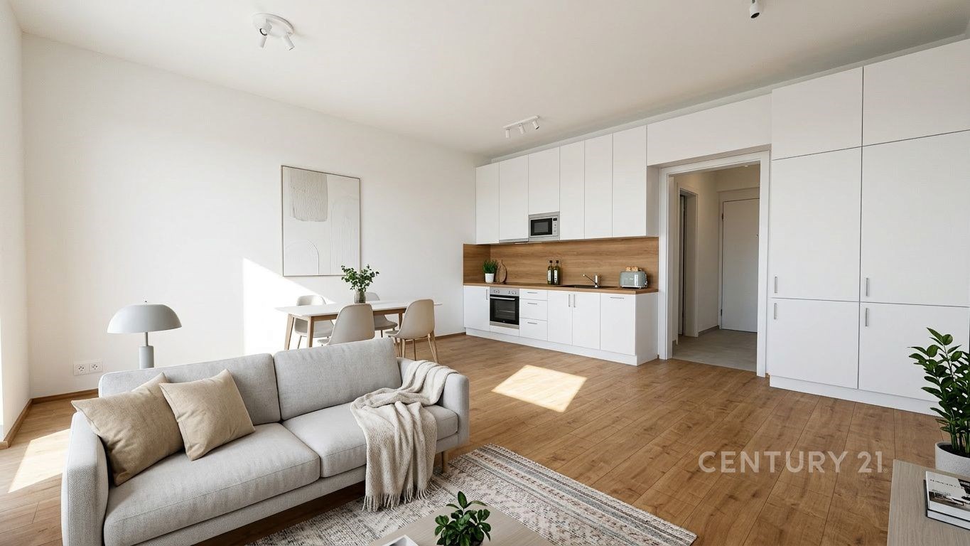 Světlý obývací pokoj s moderní kuchyní, dřevěnou podlahou a velkými okny, nabízí minimalistický design a vestavěné skříně.