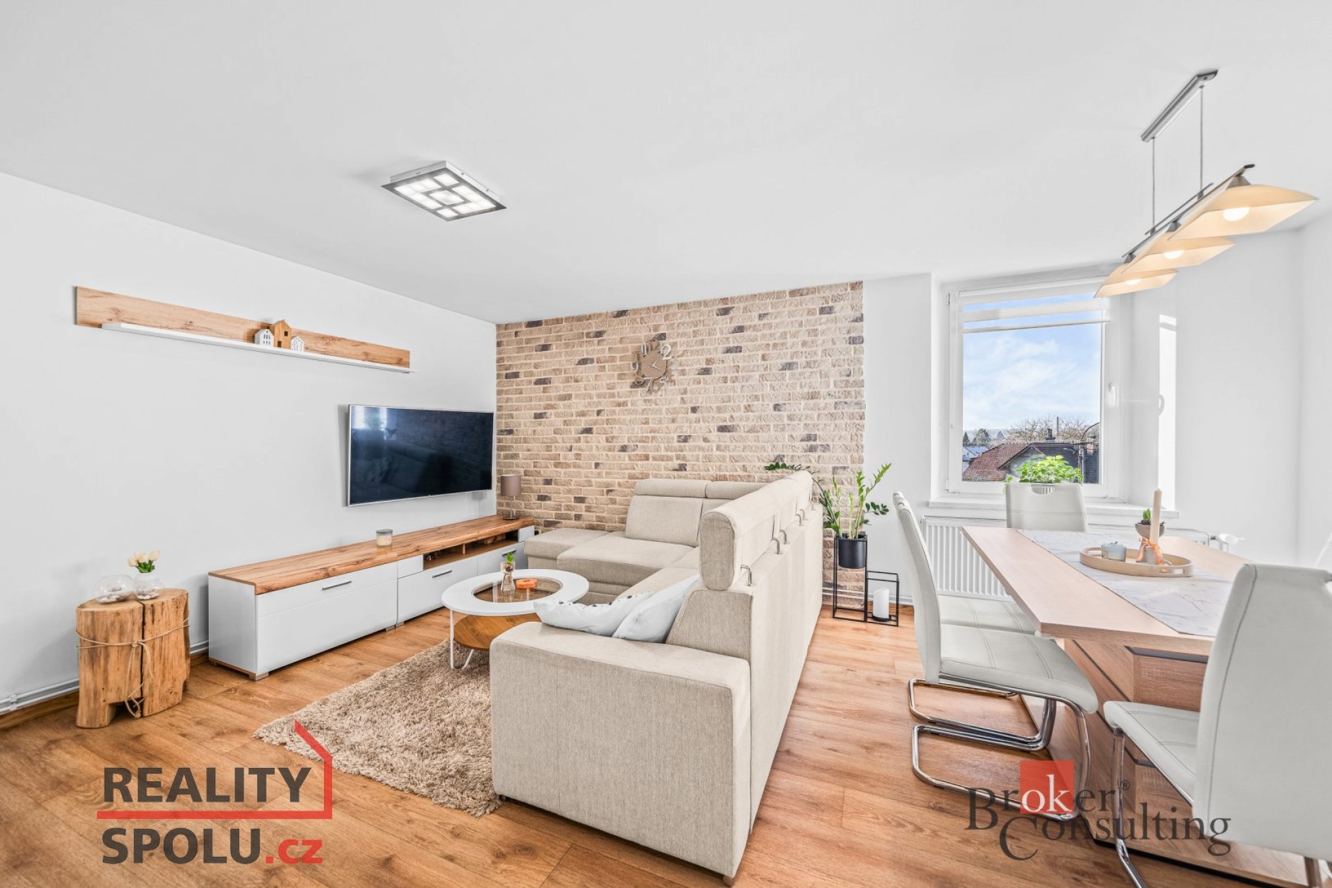 Byt 3+KK s dvěmi parkovacími místy a společnou zahradou