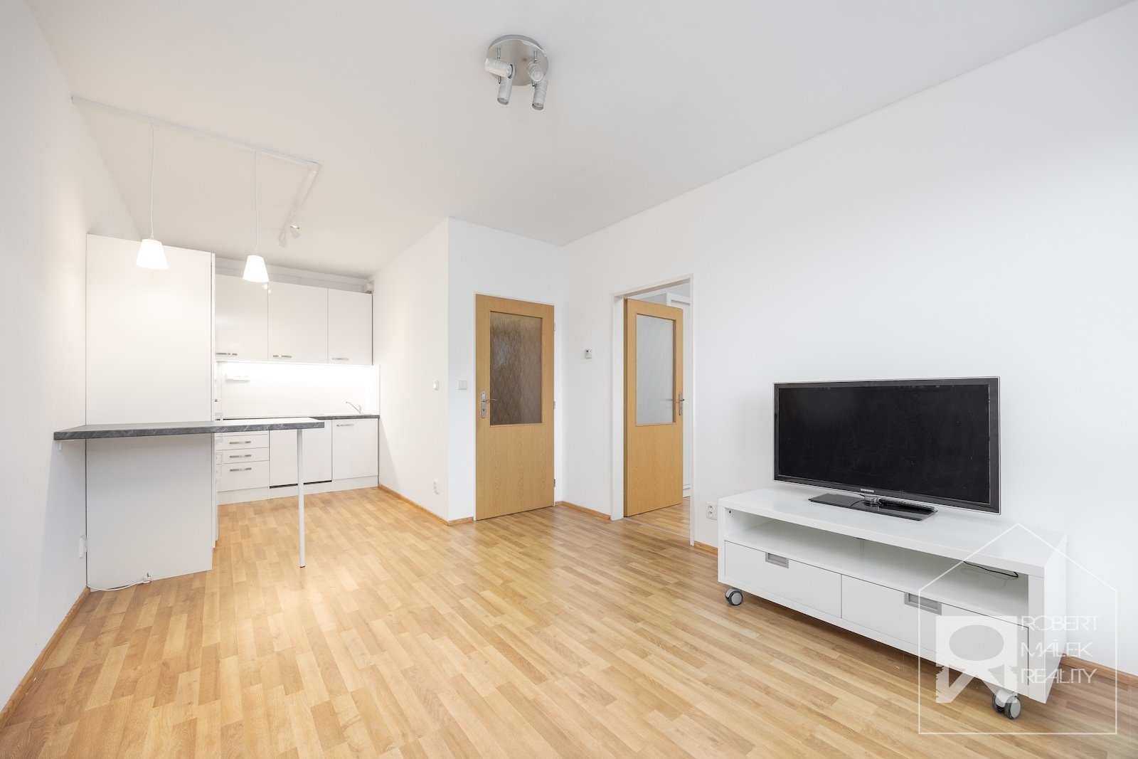 Obývací pokoj s kuchyňským koutem