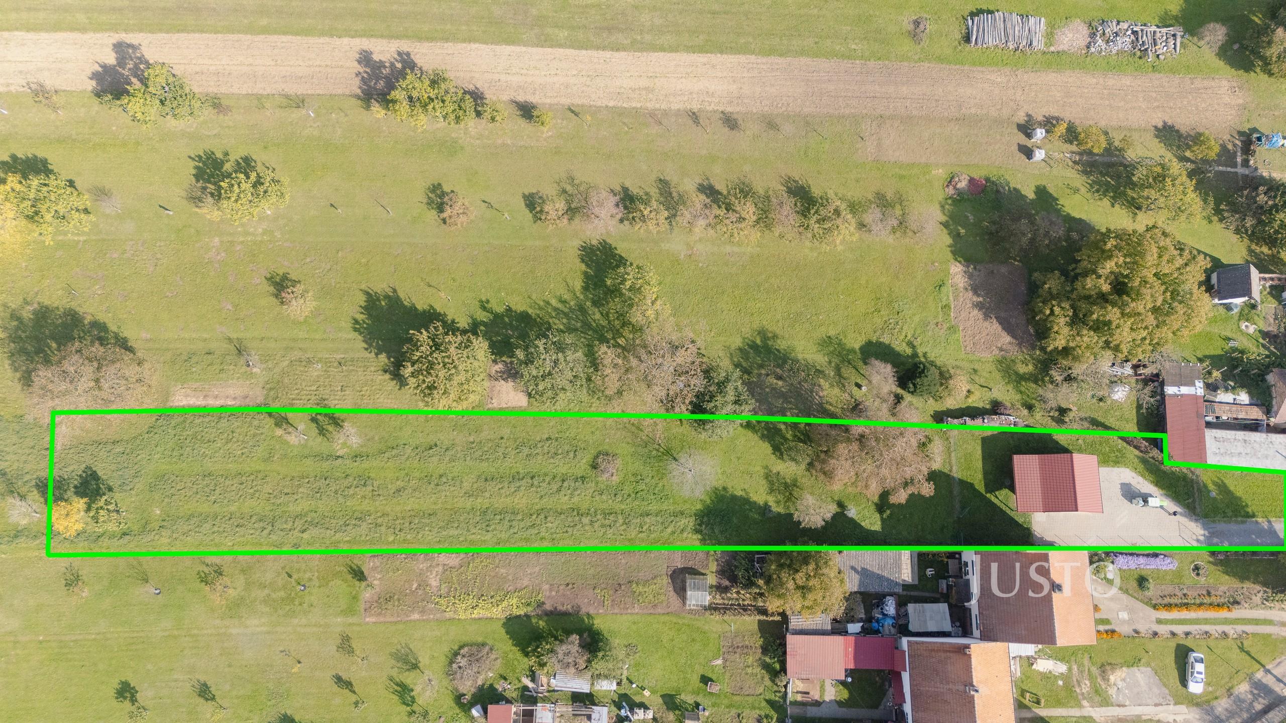 Prodej stavebního pozemku 2331 m² s dvojgaráží
