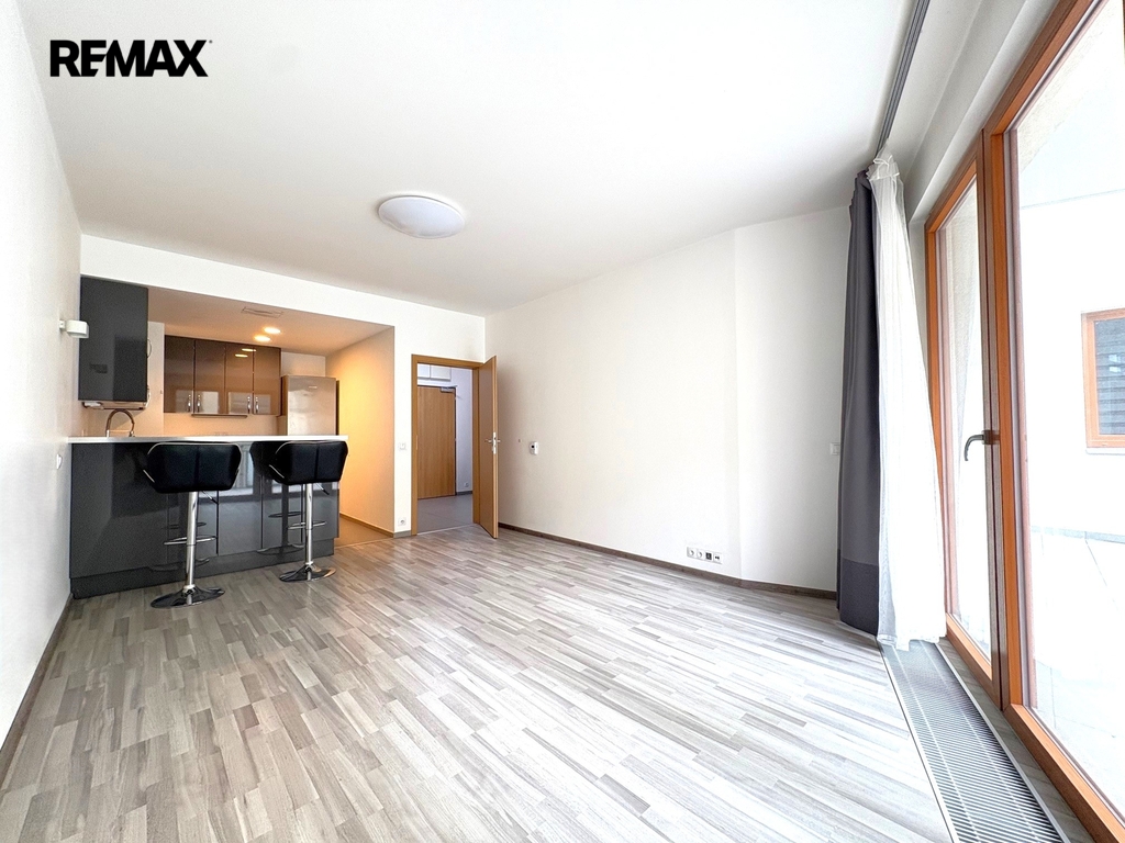 Obývací pokoj s kuchyňským koutem