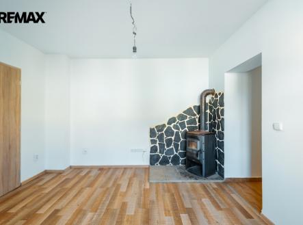 obývací pokoj s krbem | Prodej bytu, 2+kk, 57 m²