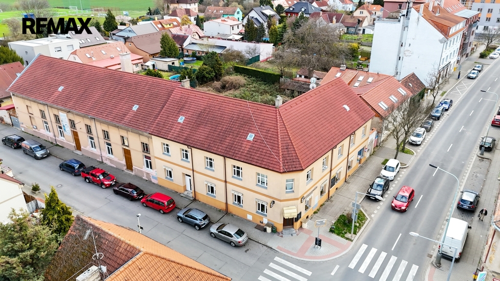 Multifunkční budova na rohu ulic Ďáblická a Kokořínská