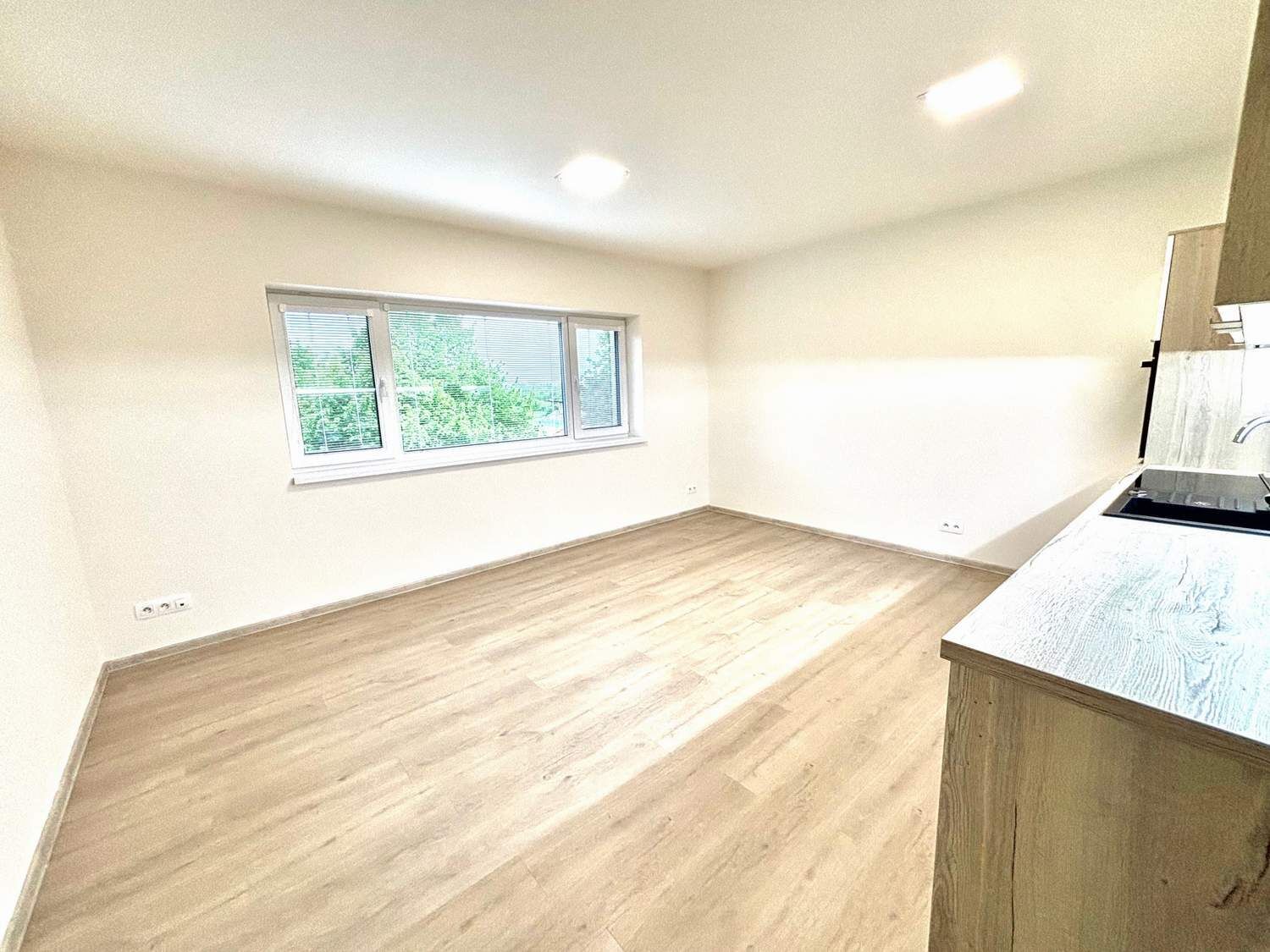 Pronájem novostavby bytu 1+kk s parkovacím stáním Židlochovice