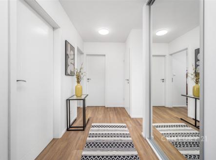 Vstupní hala s parketovou podlahou, vestavěné skříně a moderní osvětlení vytváří světlý a elegantní prostor. | Prodej bytu, 3+kk, 54 m²