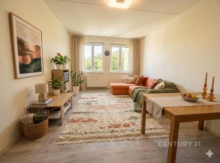 Světlý obývací pokoj, moderní laminátová podlaha, velká okna, útulný styl, vestavěné dekorace, prostorný interiér. | Prodej bytu, 1+kk, 31 m²