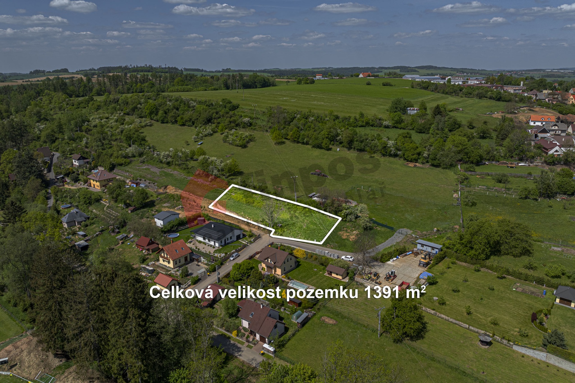 Prodej stavebního pozemku v Divišově 1391m2.
