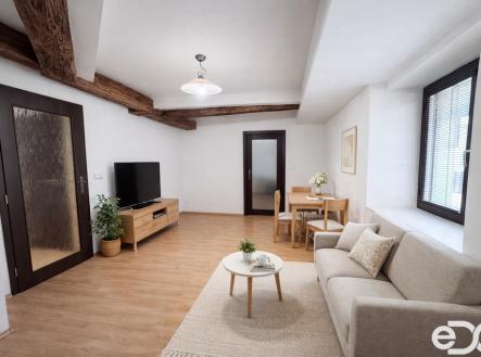 a-digital-photograph-showcases-a-living-room-that.png | Prodej bytu, 2+kk, 40 m²