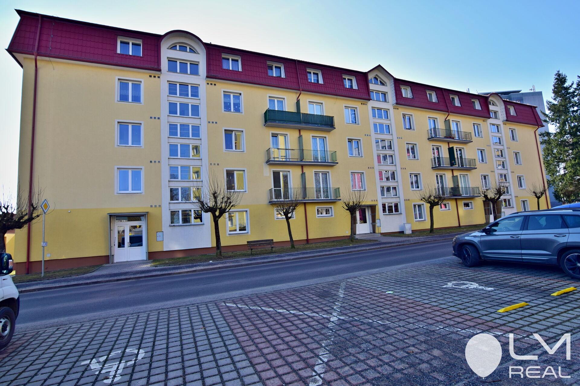 Bytový dům na Tyršově ul., ve které je byt na prodej