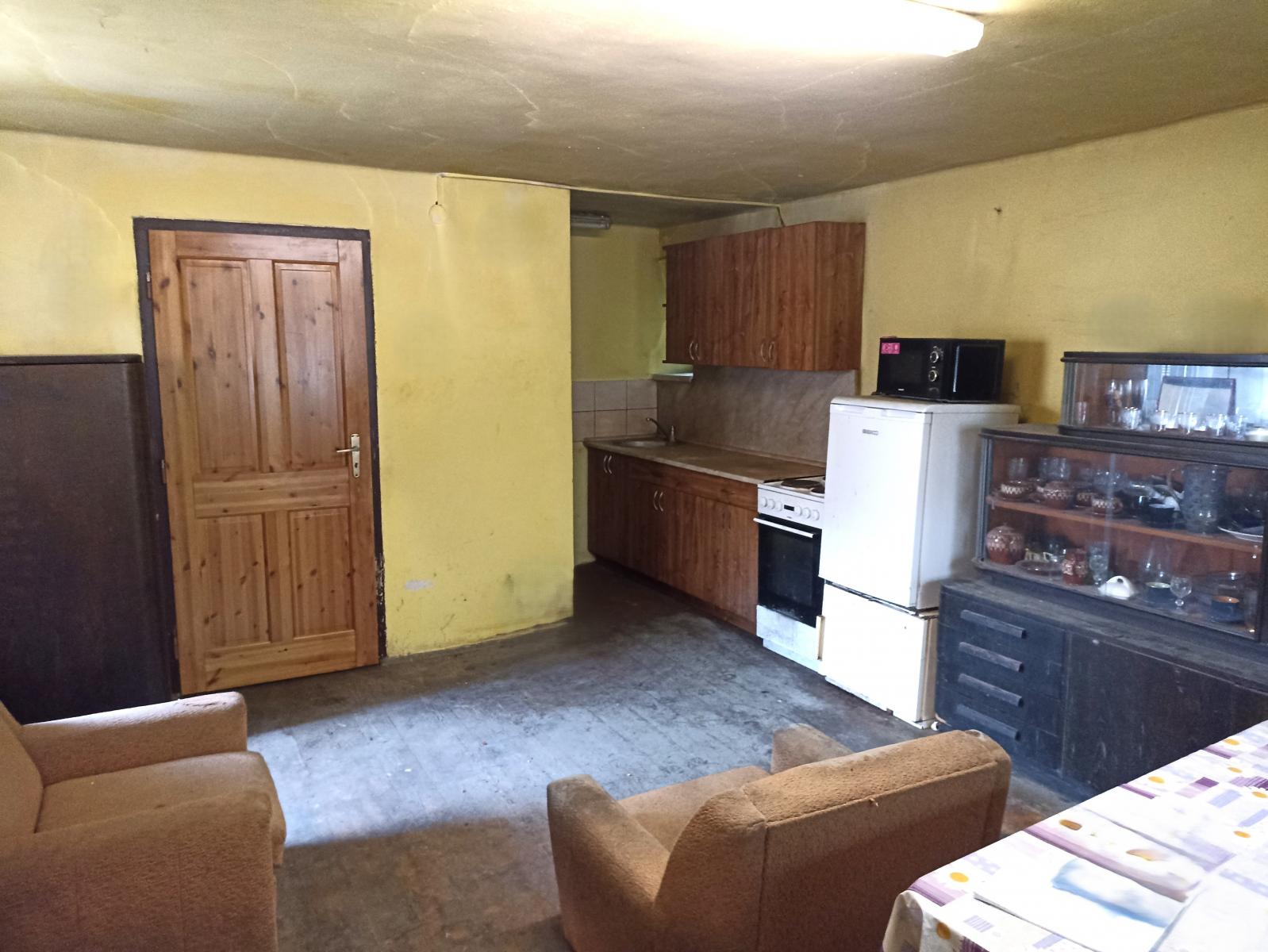 Obývací pokoj s kuchyňským koutem