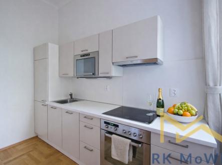 modern-kitchen-with-champagne-and-fruit.png | Pronájem bytu, 2+kk, 50 m²