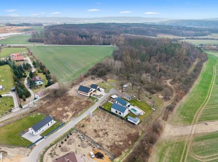 Pohled na pozemek směrem na jihovýchod | Prodej - pozemek pro bydlení, 1 257 m²