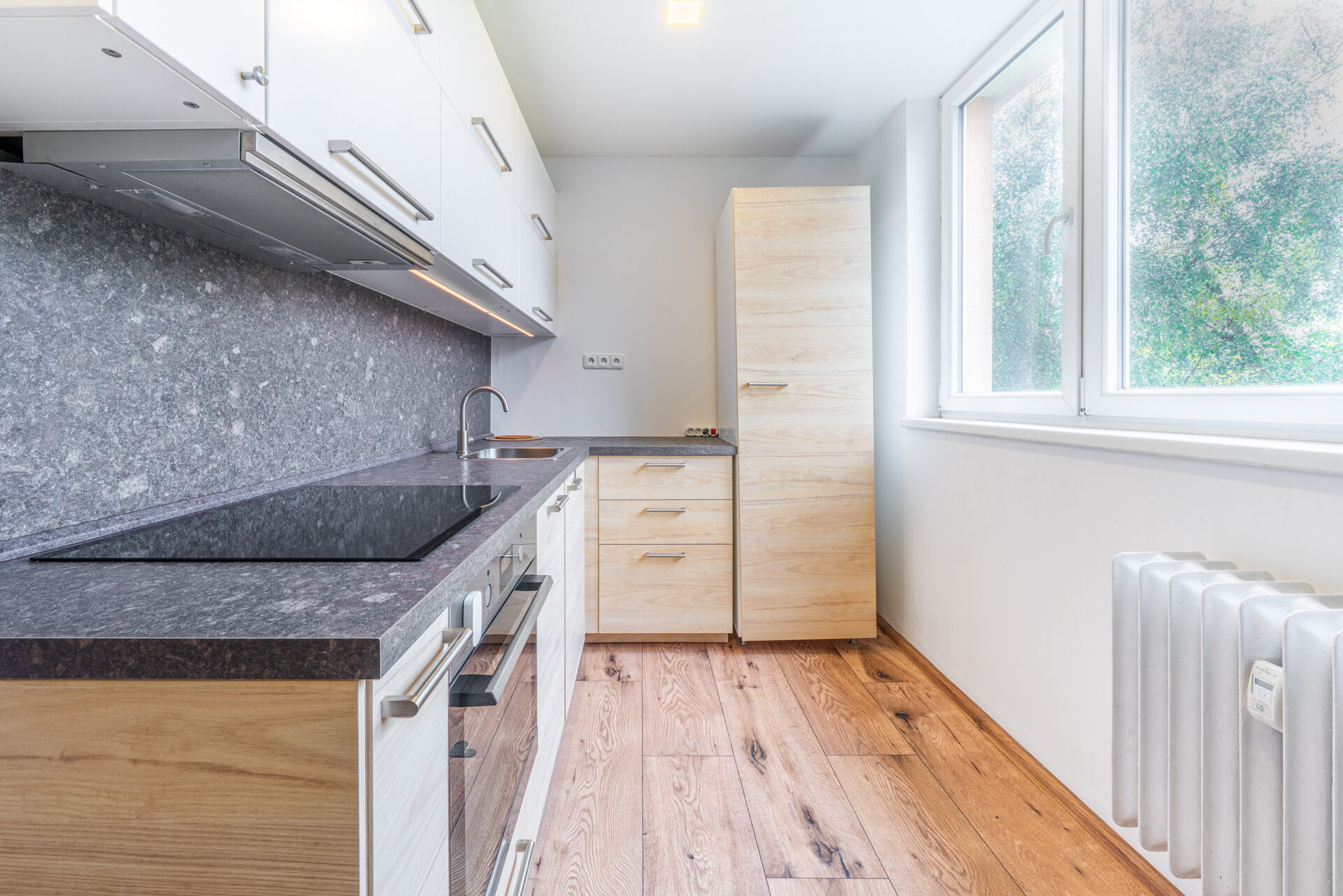 Prodej bytu 2+1 PO KOMPLETNÍ REKONSTRUKCI, 55 m2 + balkón, blízko centra města