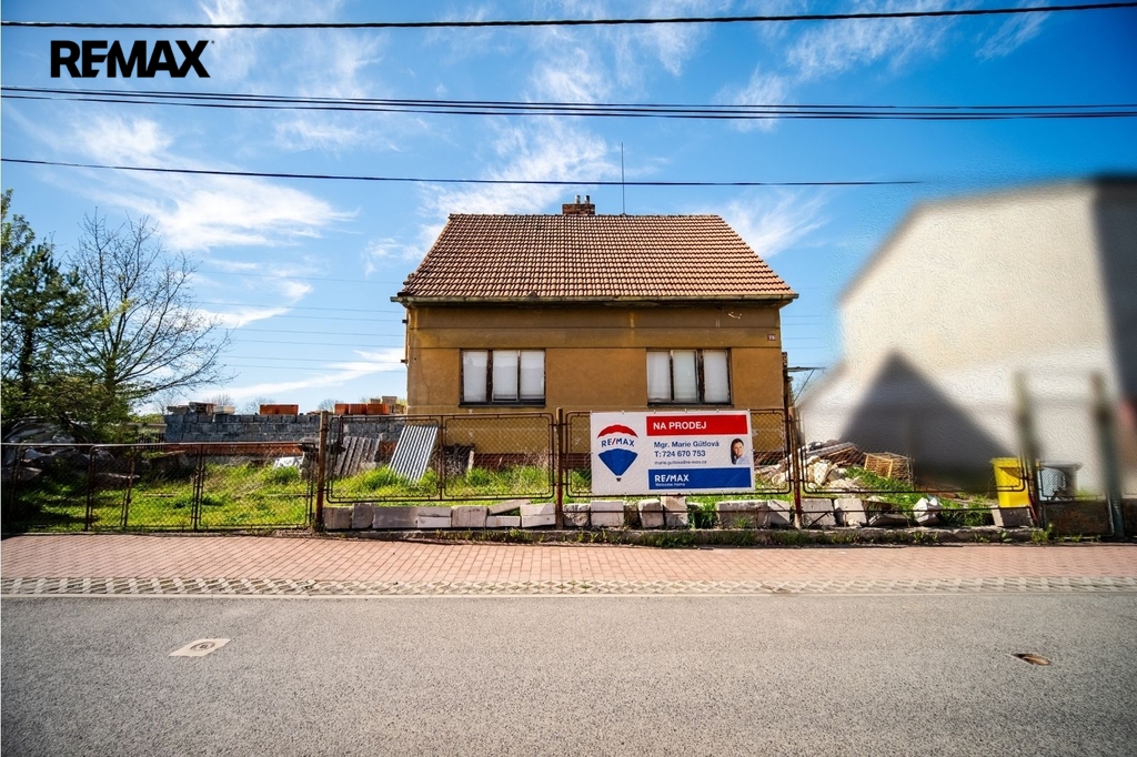 POZEMEK LIBIŠ - POHLED Z ULICE ZA KRALUPKOU