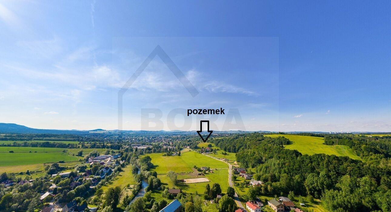 Stavební pozemek s velkou loukou