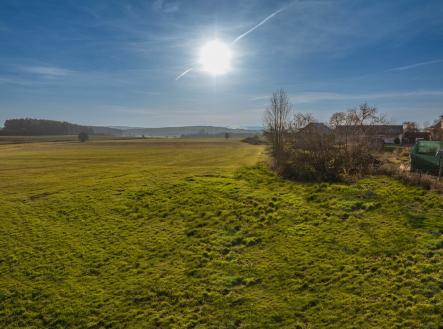 Pohled na parcelu ze sousedního pozemku | Prodej - pozemek pro bydlení, 1 157 m²