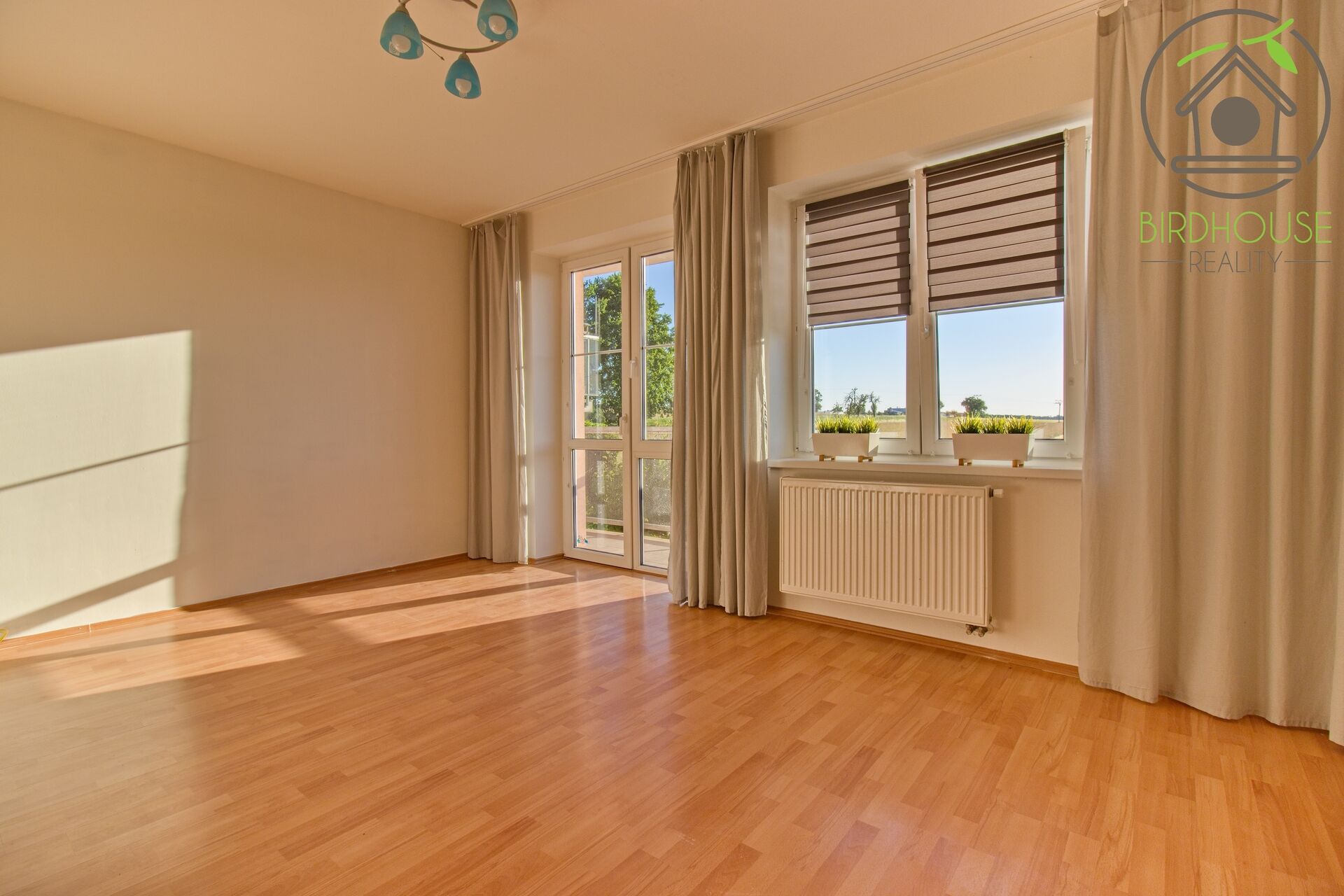 Prodej bytu 2+kk 62,27 m2 s balkonem a výhledem do zeleně v Modleticích