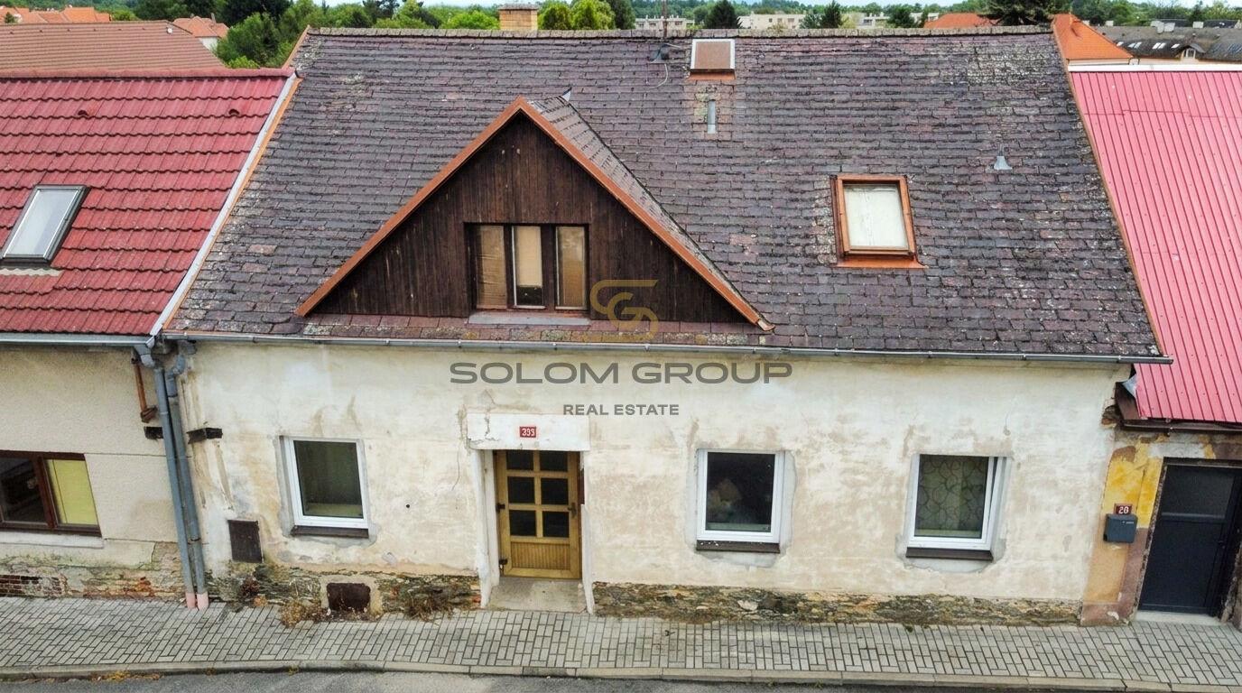 Rodinný řadový dům 3+1 se zahrádkou, Týnec nad Labem