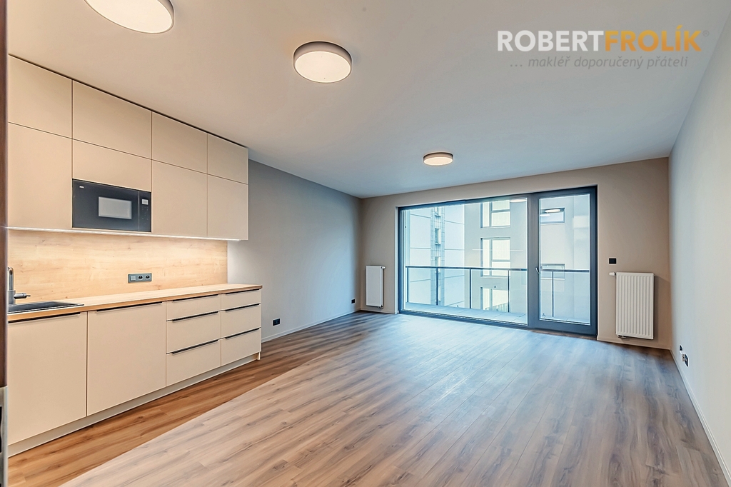 Nezařízený byt 3+kk s balkonem a garážovým stáním - Praha 5, Košíře - ul. Starokošířská - projekt Starokošířská Avenue - obývák s kuchyňským koutem